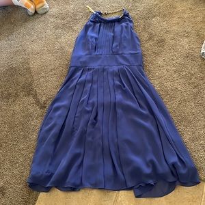 Mid length dress worn once, gold detail around the neck no sleeves